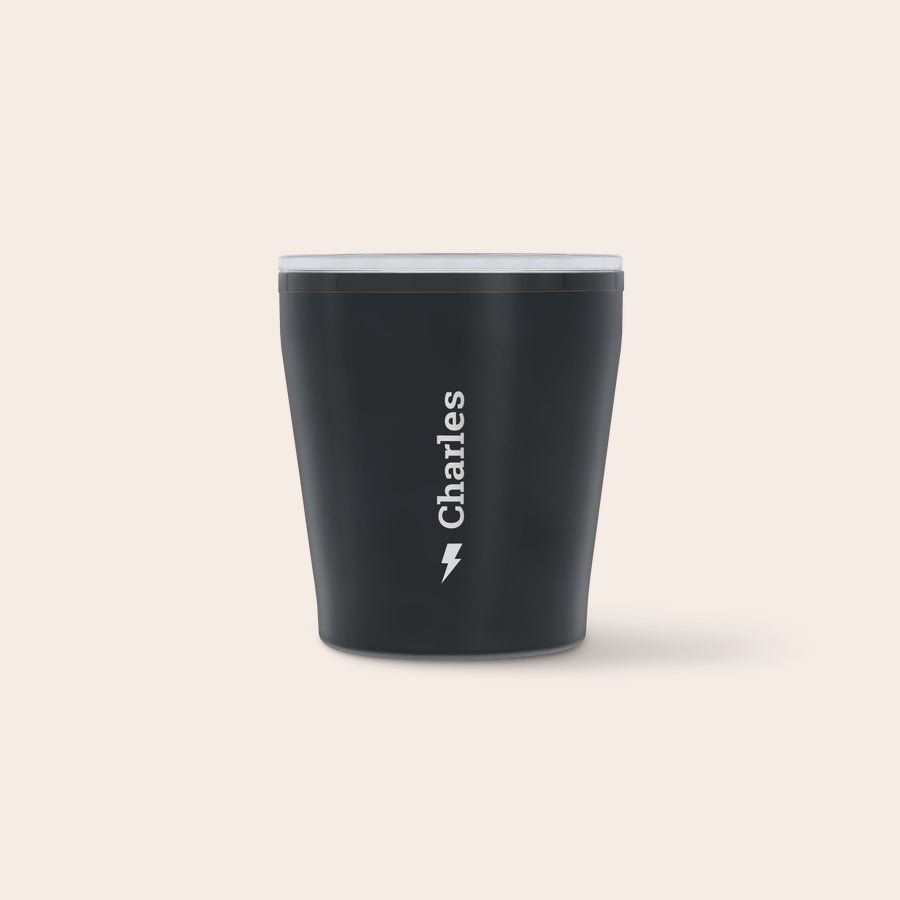 Dark grey personalized travel mug with "Charles" and a lightning bolt printed on it to sip in style.