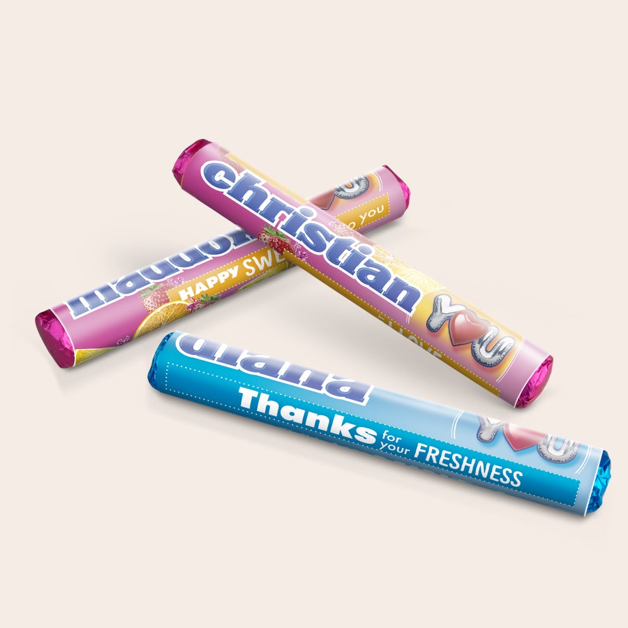 Personalized Mentos rolls in a gift box with printed names and compliments like "Thanks for your Freshness."