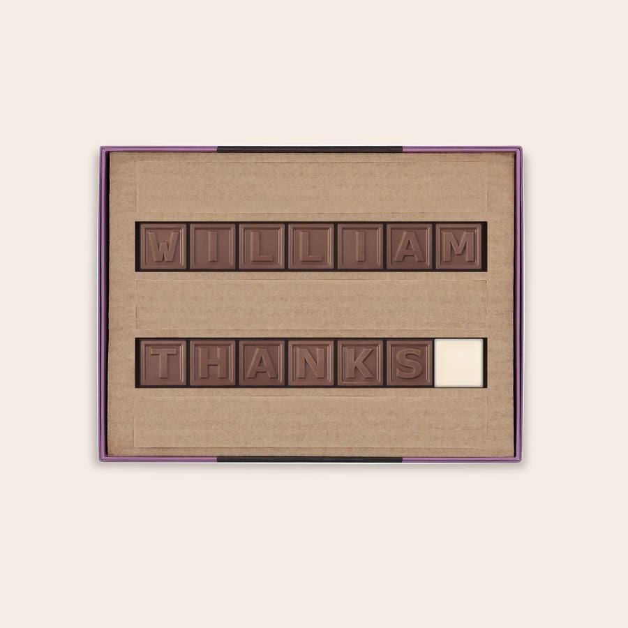 Personalised Chocolate Telegram A chocolate telegram spelling WILLIAM THANKS with personalized milk chocolate letters and a white chocolate space