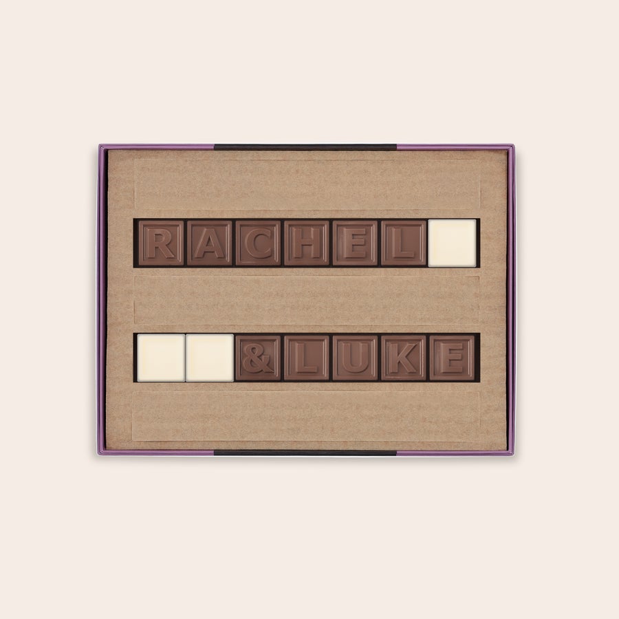 Personalised Chocolate Telegram Personalized chocolate telegram in a brown box spells out RACHEL & LUKE in milk chocolate with white chocolate spaces
