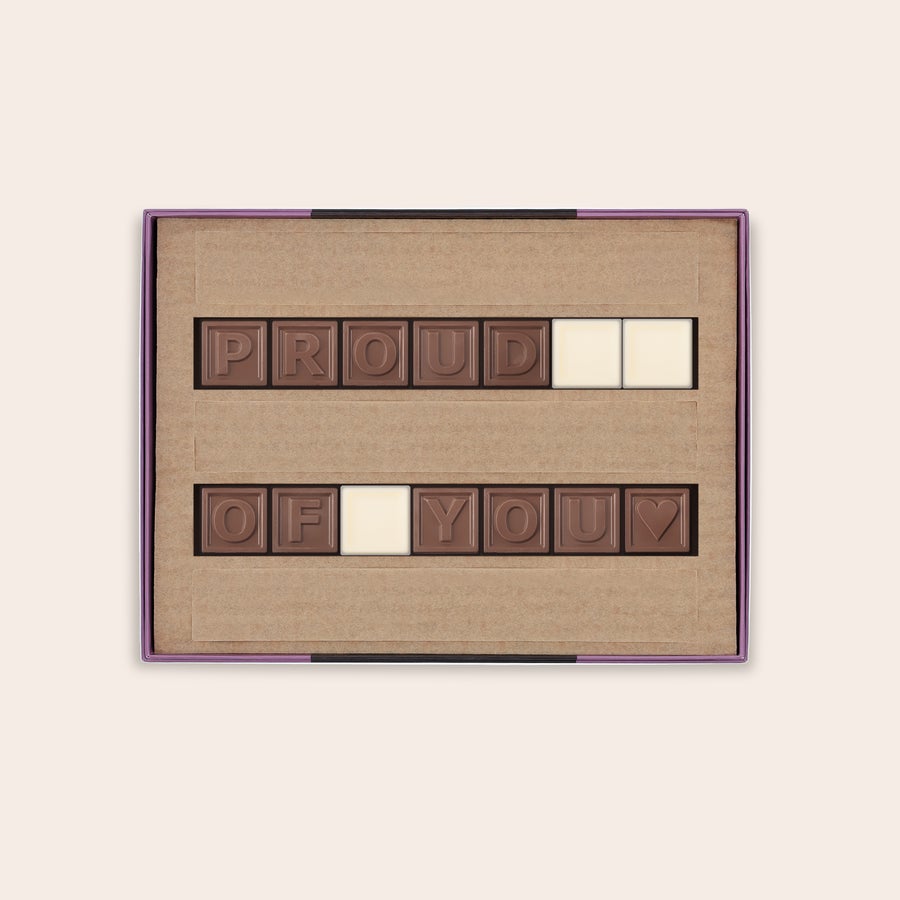 Personal chocolate telegram spelling PROUD OF YOU in a gift box with customizable letters
