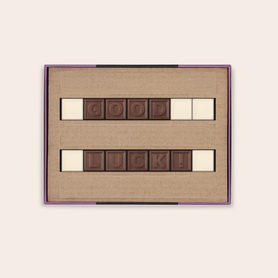 Personalised Chocolate Telegram A personalized chocolate telegram with milk chocolate letters spelling GOOD LUCK and white chocolate spacers