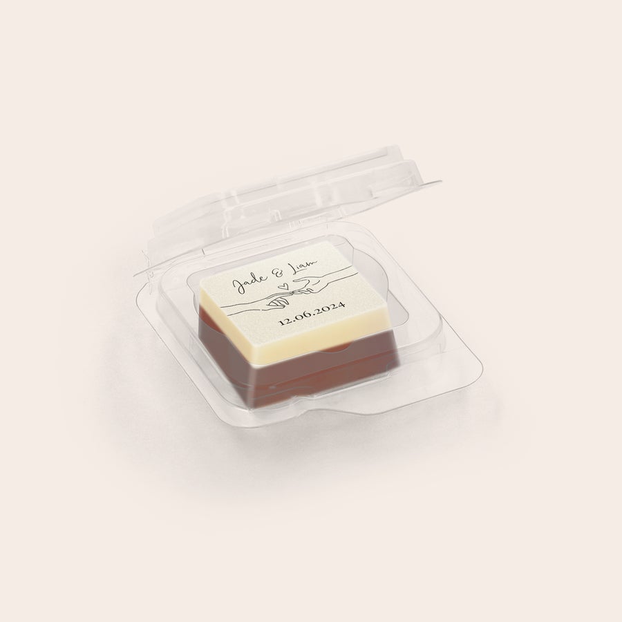 Personalised photo chocolates - Individually wrapped Delicious chocolate favours with a custom photo or logo, showing a personalized treat with "Jade & Liam" and "12.06.2024" printed on white chocolate