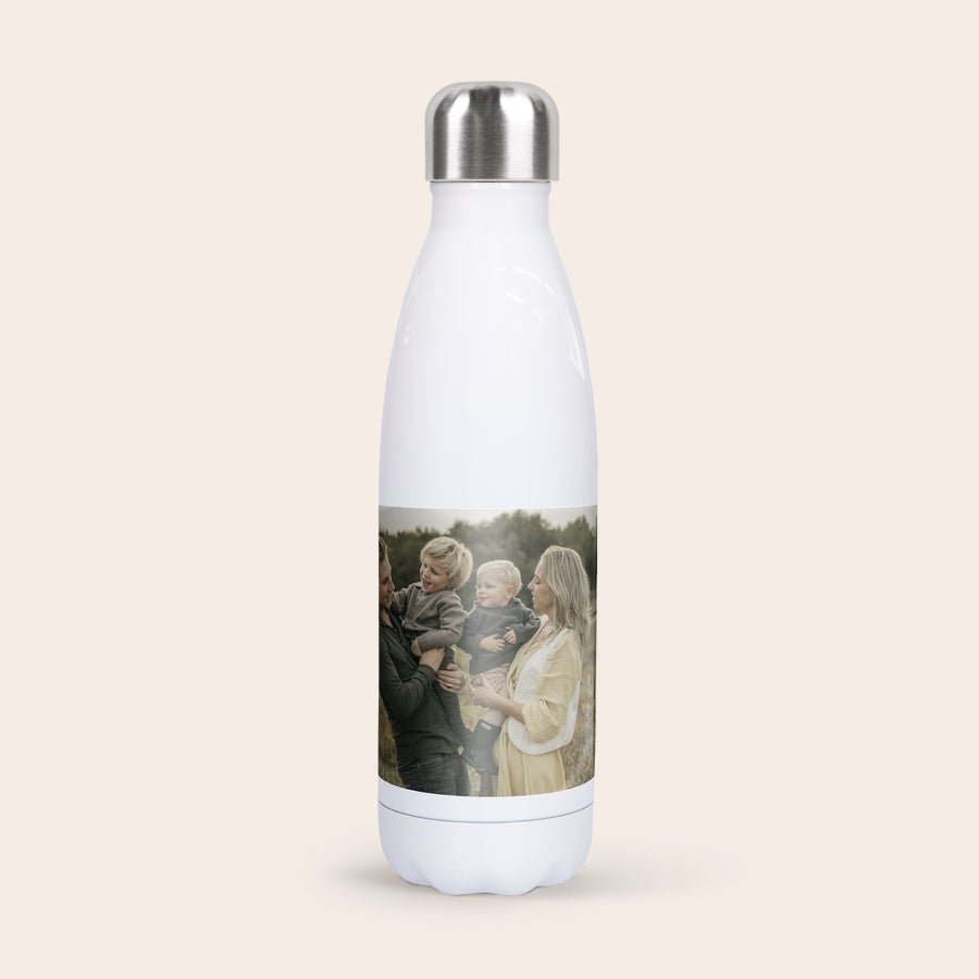 A white personalised insulated water bottle printed with a family photo. Stay hydrated with a custom bottle.