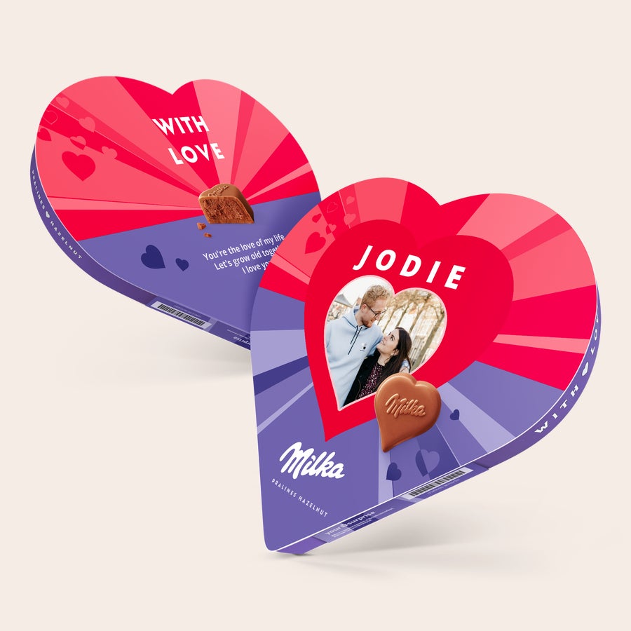 A personalized Milka heart gift box with a photo of a couple and the name Jodie printed on it.