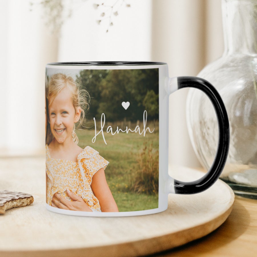 Custom Color Mug A personalized black and white coloured mug with a young girl and the name Hannah printed on it. Give a coloured mug as a gift!