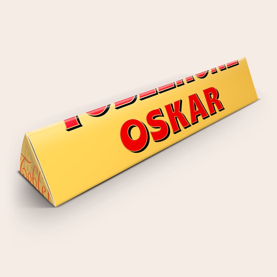 Large personalised Toblerone bar with the name Oskar printed in red on the yellow wrapper