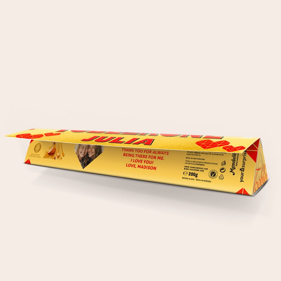Delicious Toblerone bar with a custom wrapper printed with the name Julia, a photo, and a message.