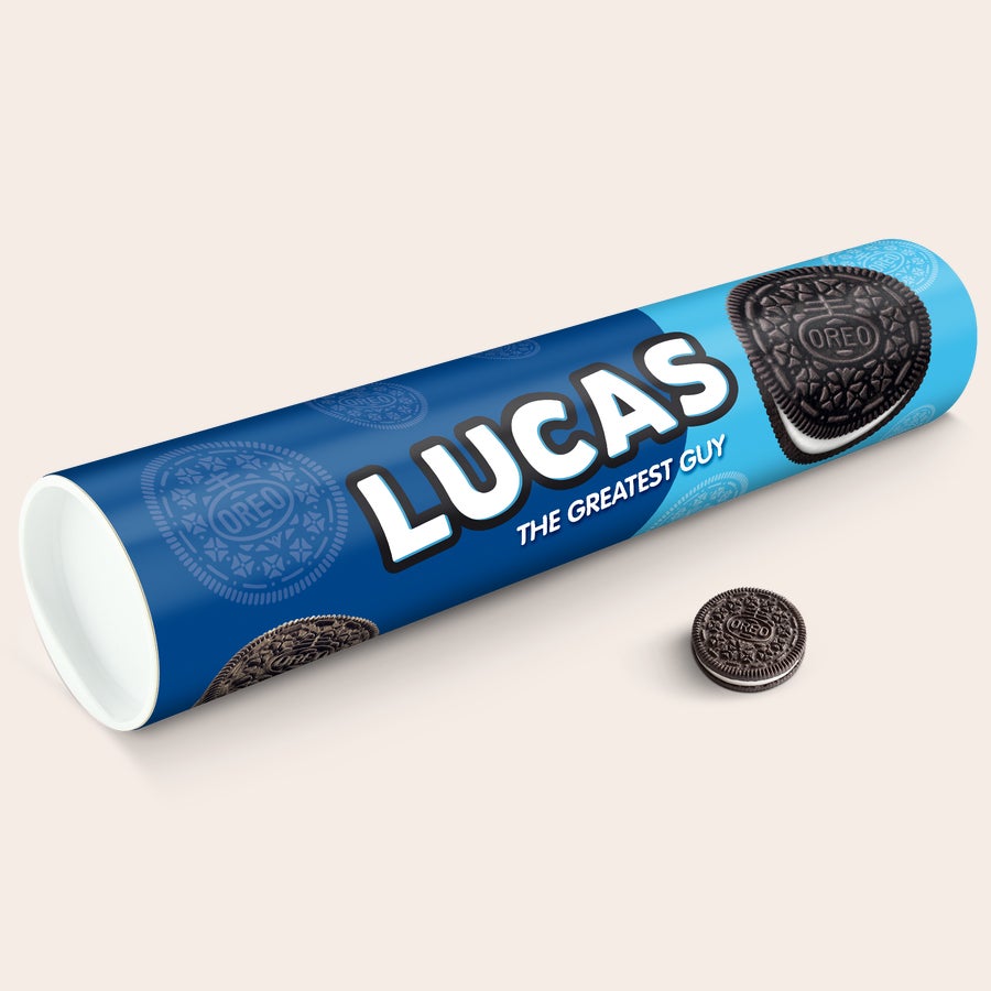 Personalised XXL Oreo Gift Tube Personalized Mega Oreo Gift Tube with name Lucas and text The Greatest Guy printed on blue packaging, with one Oreo cookie next to it